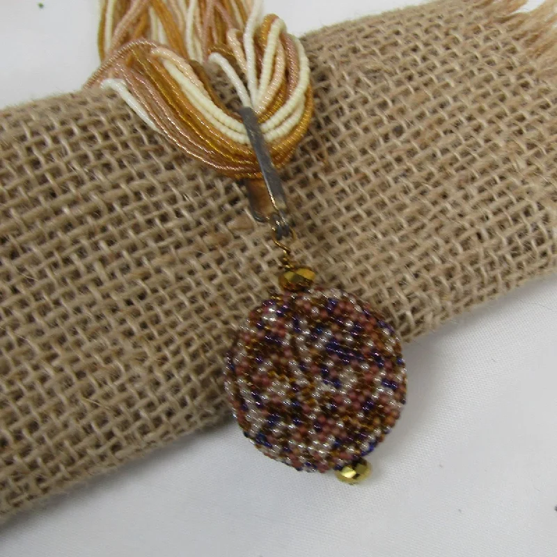 multi-layered gold necklace-Flax Seed Bead Twisted Necklace with Gold Tone Pendant